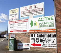 Signs for businesses on Maltings Industrial Estate, Trowbridge, Wiltshire, England, UK