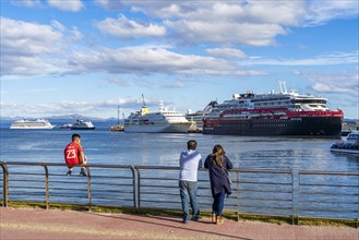 People watching cruise ships in the harbour at the Beagle Channel, Ushuaia, Tierra del Fuego