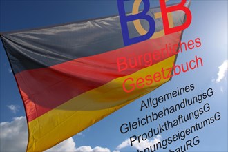 Symbolic image: Civil Code (BGB) in front of a blue sky with the German flag