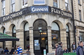 Flan O'Briens Irish pub Guinness advert, Bath, Somerset, England, UK