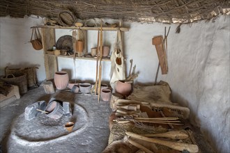 Re-creation of neolithic home, contents, weapons, tools, Stonehenge, Wiltshire, England, UK
