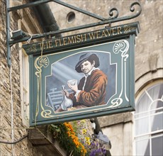 Pub sign for The Flemish Weaver, Corsham, Wiltshire, England, UK