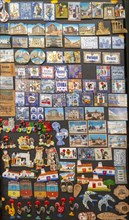 Close up tourist souvenir products on sale including fridge magnets, city of Evora, Alto Alentejo,