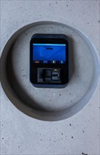 Keycard and Digital Door Lock on a Modern Concrete Wall in Switzerland