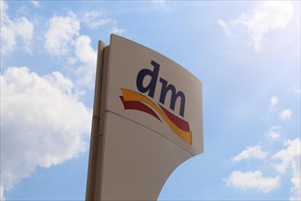 Logo of the drugstore chain DM
