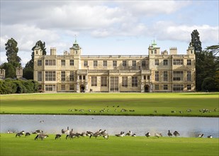 Lawn, geese, River Granta at front of Audley End House and Gardens, Saffron Walden, Essex, England,
