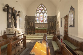 Altar and sanctuary monument inside church of Saint Andrew, Bramfield, Suffolk, England, UK