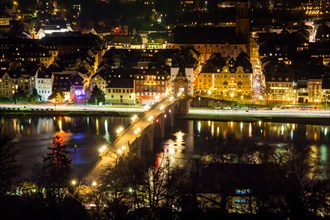 Night shot of Heidelberg's old town. Photographed in December 2022 from a vantage point on