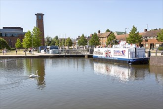 Royal Shakespeare Company theatre from the canal and Bancroft Gardens, Stratford- upon-Avon,