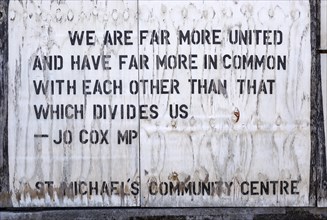 Quotation from MP Jo Cox on community centre board, Ipswich, Suffolk, England, UK