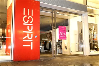 Shop window of the Esprit shop in Mannheim with advertising for big discounts