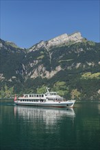 Excursion boat on Lake Uri near Bauen with the Niederbauen, Lake Lucerne, Canton Uri, Switzerland,