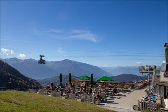 Rosshuette mountain station in Seefeld/Tyrol. Many tourists and locals take advantage of the sunny