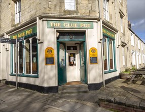 The Glue Pot pub on corner of terraced housing street in the Railway Village, Swindon, Wiltshire,