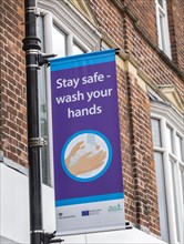 Stay safe wash your hands Covid 19 information poster, Newbury, Berkshire, England, UK