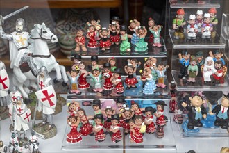 Typical Spanish souvenir products on display in shop window, Frigiliana, Axarquia, Andalusia,