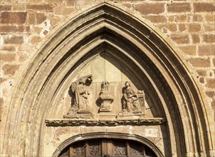 Aragonese Gothic architectural style carvings around doorway, Santa Maria la Mayor, Ezcaray, La