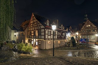 Historic half-timbered houses in the old town at night in autumn rain, Lauf an der Pegnitz, Middle