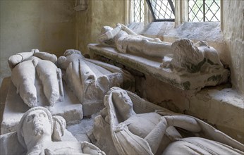 Medieval effigies inside Nunney church, Somerset, England, UK, foreground Sir John Paulet died 1437