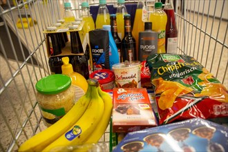 Shopping trolley with food in a supermarket in Germany
