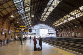 Passengers on platform at Temple Meads railway station, Bristol, England, UK, designed by Isambard
