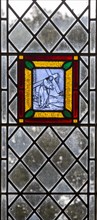Village parish church Cratfield, Suffolk, England, UK stained glass panel of Jesus Christ carrying