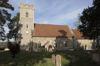 Village parish church and graveyard of Saint Peter, Sibton, Suffolk, England, UK