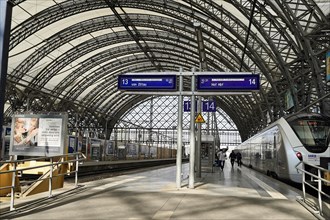 Railway station central railway station Hbf Deutsche Bahn DB with trains symmetrical panorama in