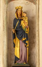 Interior historic village parish church, Wingfield, Suffolk, England, UK statue blessed Virgin Mary