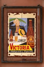 Ceramic tile advertising poster for Victoria beer brewed in Malaga, Spain, Cervezas Victoria
