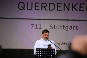 Michael Ballweg speaks at the large lateral thinkers' demonstration in Stuttgart. The motto of the