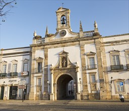 Neoclassical architecture Arco da Vila built after the 1755 earthquake, city of Faro, Algarve,