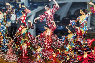 Flamenco dancers Spanish souvenir products on display in shop window, Frigiliana, Axarquia,