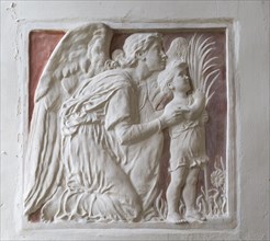 Church of Saint Peter, Blaxhall, Suffolk, England, UK plaster bas-relief angel and child by Ellen