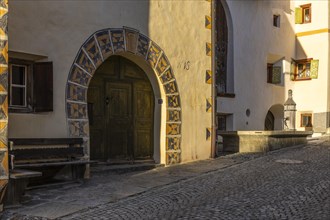 Front door, window, sgraffito, facade decorations, Guarda, Engadin, Graubuenden, Switzerland,