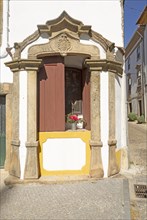 Small roadside religious Christian shrine on street, Castelo de Vide, Alto Alentejo, Portugal,