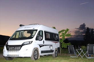 Camping holiday in Germany: motorhome at sunset on the Rehm winery pitch in Edesheim, Palatinate