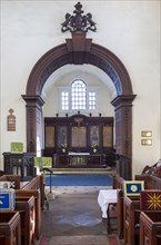 Village parish church Shotley, Suffolk, England, UK chancel arch and altar