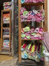 Woven cotton rugs called Jarapas or Harapas, on sale outside shop in village of Nijar, Almeria,