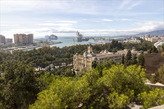 Cityscape view over city centre and dock area Malaga, Andalusia, Spain, Trasmediterranea ferry in