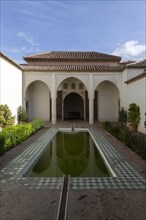 Islamic design architectural detail inside the Moorish palace of the Alcazaba, Malaga, Andalusia,