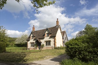 Attractive detached house built from chalk stone in village of Compton Bassett, Wiltshire, England,