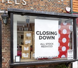 Closing down banner sign shop window, Jack Wills store, Marlborough, Wiltshire, England, Uk