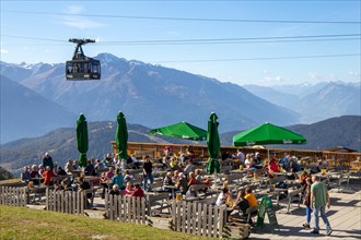 Rosshuette mountain station in Seefeld/Tyrol. Many tourists and locals take advantage of the sunny