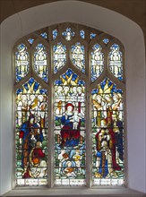 Stained glass east window Adoration of Magi by Powell and Son c 1915, Erwarton church, Suffolk,