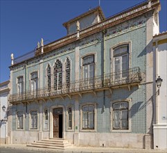 Historic old traditional Portuguese building with facade of ceramic tiles Azulejo pattern, Castro