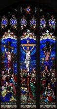 Stained glass window Crucifixion, c 1865 by H Hughes, Wetherden church, Suffolk, England, UK