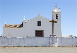 Whitewashed building rural country village catholic church Igreja Santa Barbara de Padroes, near