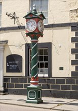 Victorian Jubilee clock 1897 on street in town of Cricklade, Wiltshire, England, UK