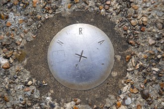 Looking down from above onto steel National Rivers Authority E1 location marker, Shingle Street,